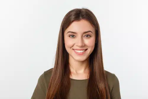 young woman casual portrait in positive view, big smile